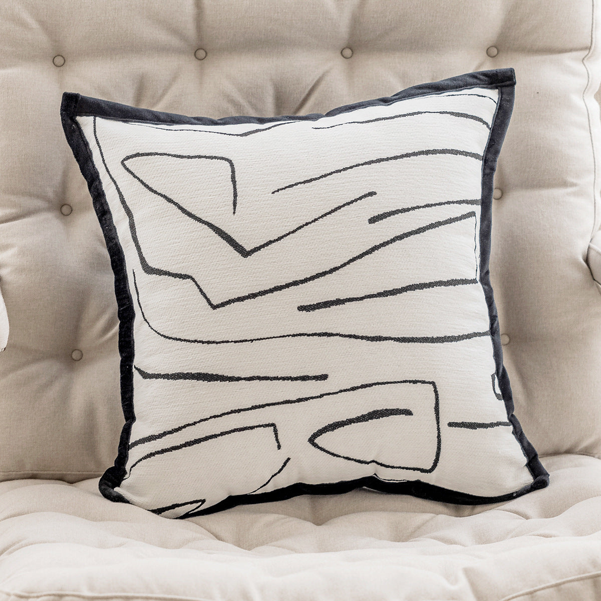 Modern and Luxurious Black and White Throw Pillow